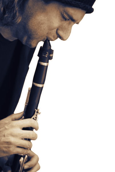 Profile close-up, lips to the clarinet reed