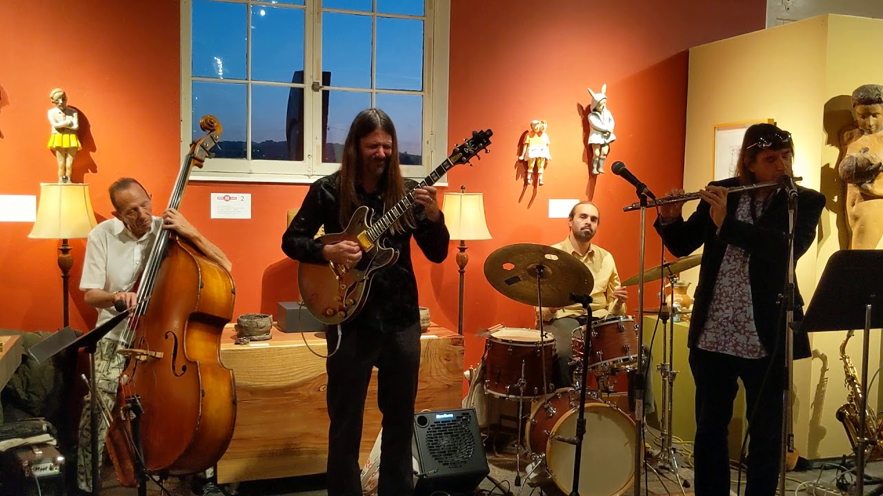Chris & Neil & Joe & Dan playing a living room